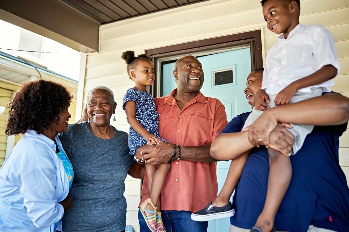 Multigenerational family gathering together at home