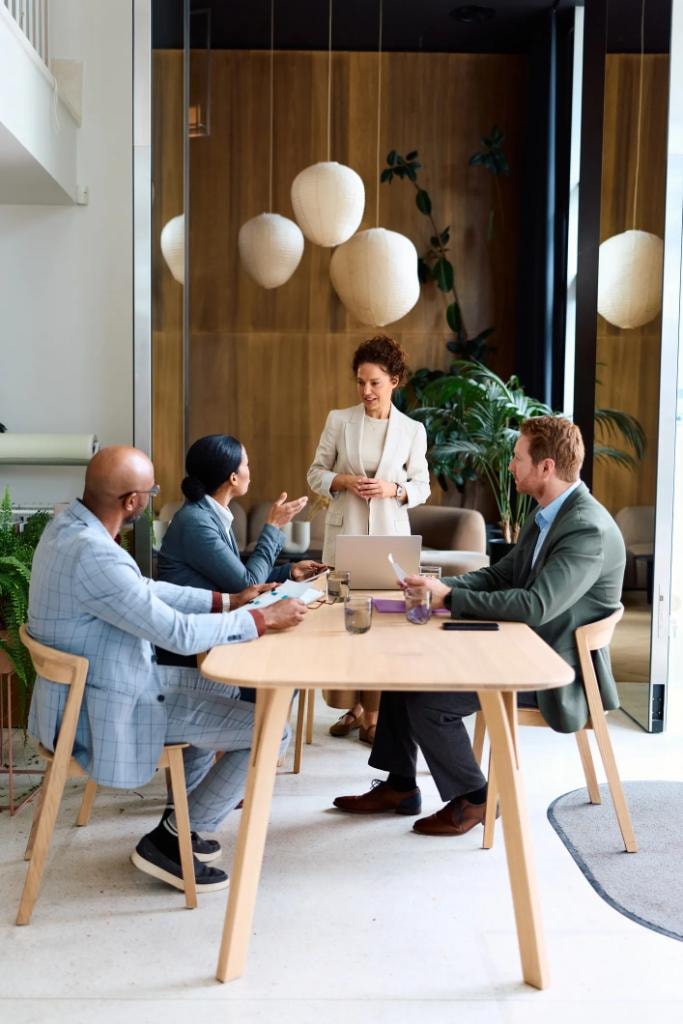 Professional insurance team meeting with clients